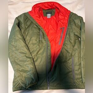 Exterus insulated jacket in green with a bright red interior linin